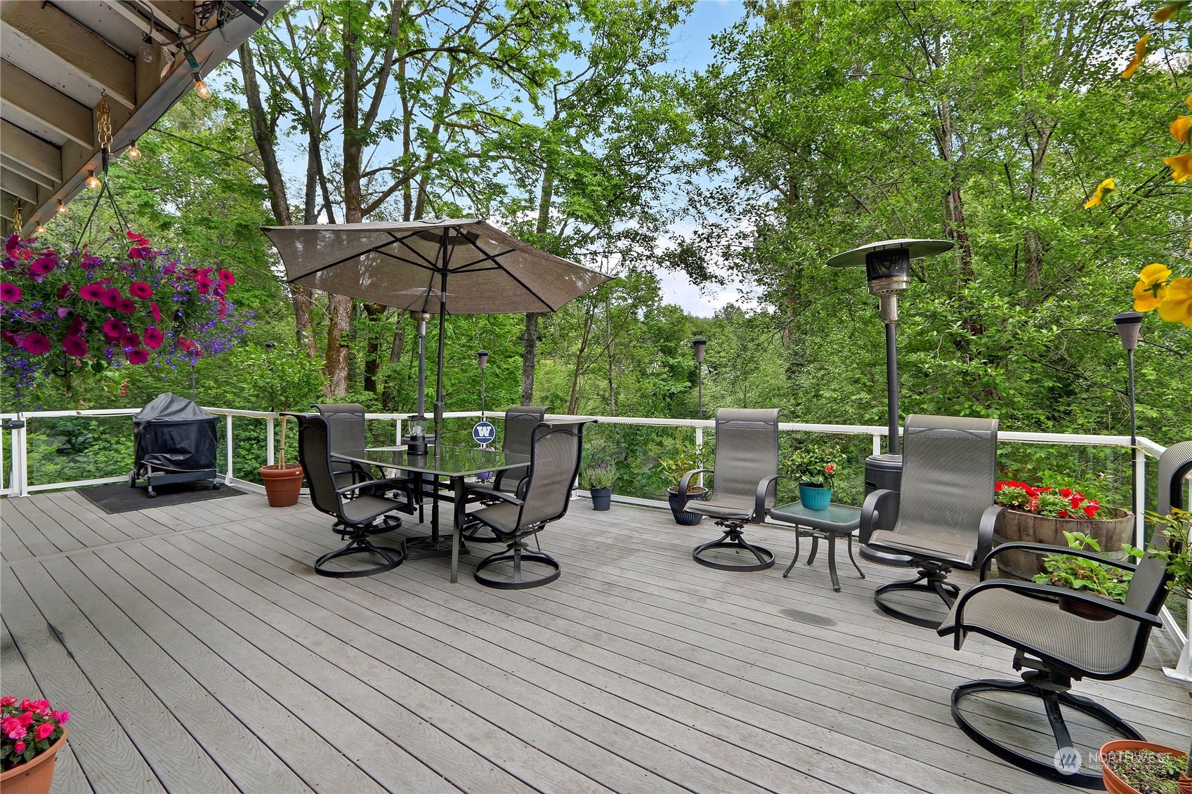 23113 Barker Road Bothell, WA 98021 - Photo 17 of 37 a view of a chairs and tables in the patio