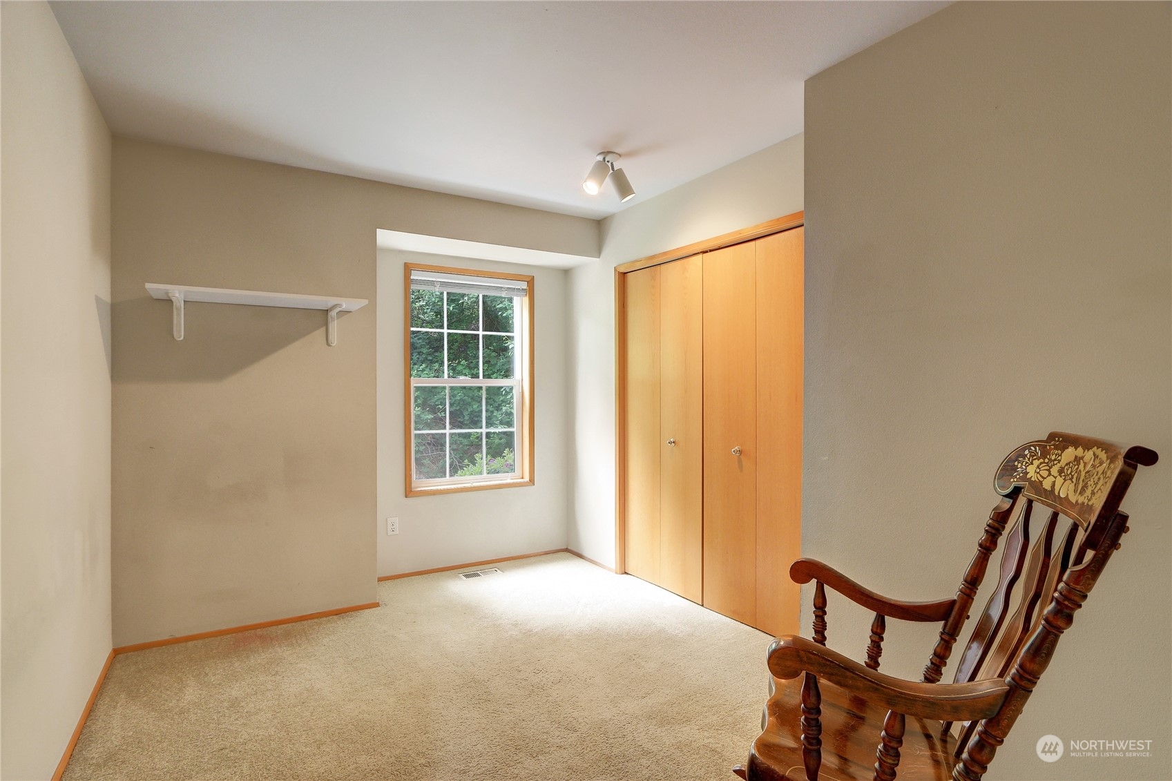 23113 Barker Road Bothell, WA 98021 - Photo 23 of 37 a view of an empty room with furniture and a window