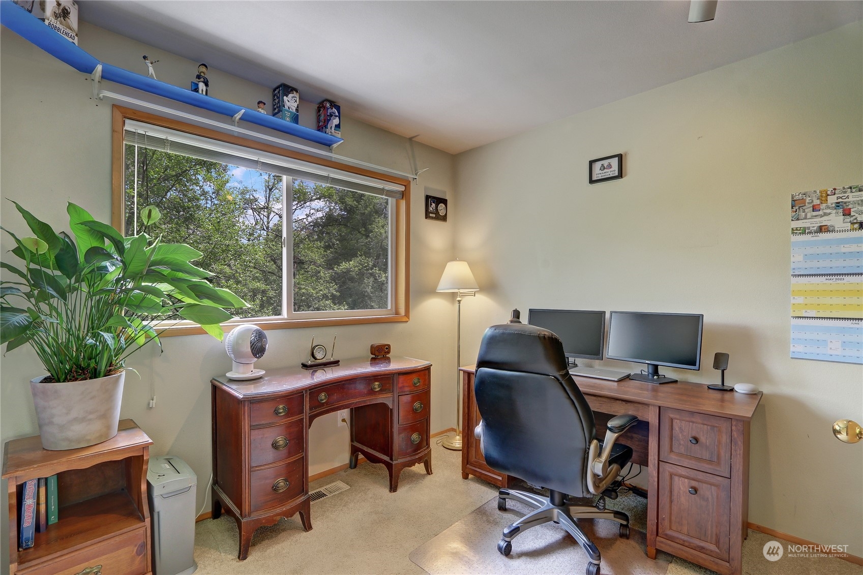 23113 Barker Road Bothell, WA 98021 - Photo 25 of 37 a view of a workspace with furniture and a window