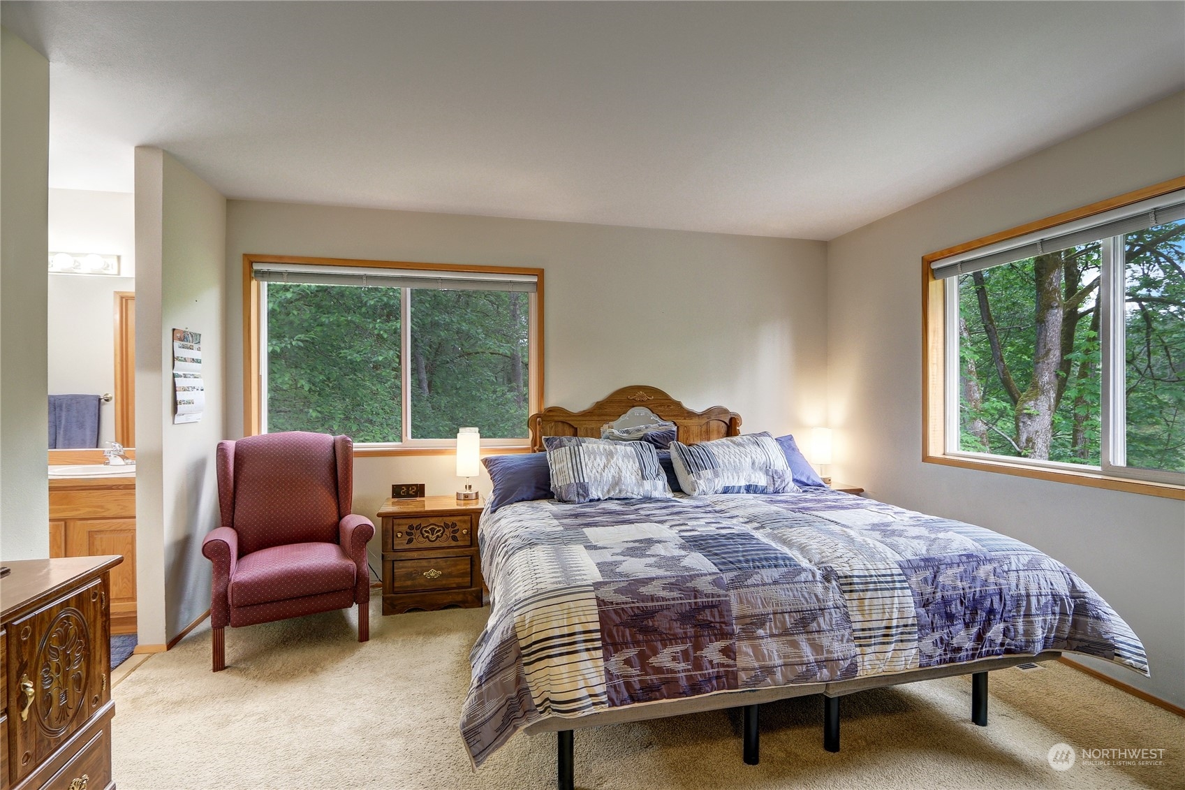 23113 Barker Road Bothell, WA 98021 - Photo 26 of 37 a bedroom with a bed and a large window