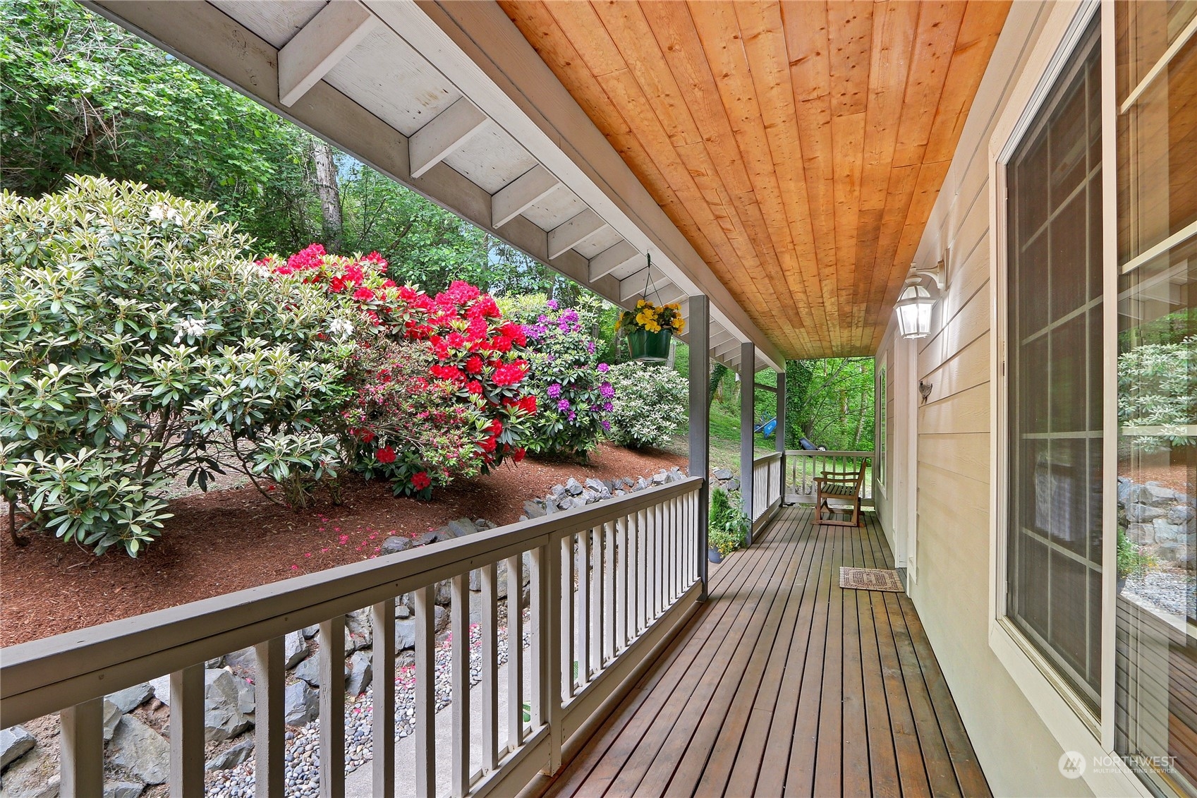 23113 Barker Road Bothell, WA 98021 - Photo 3 of 37 a view of a balcony with flower plants