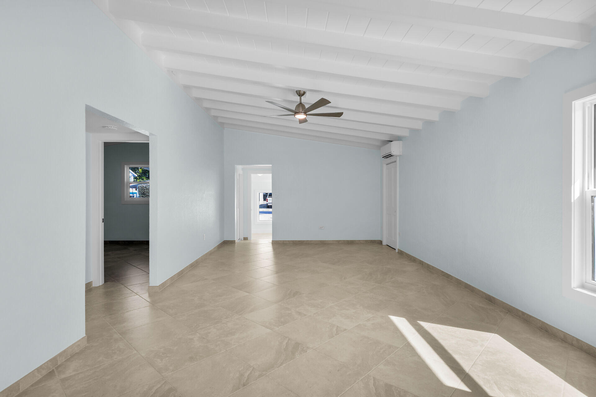 251 Azalea Street Tavernier, FL 33070 - Photo 22 of 58 an empty room with a ceiling fan and a window