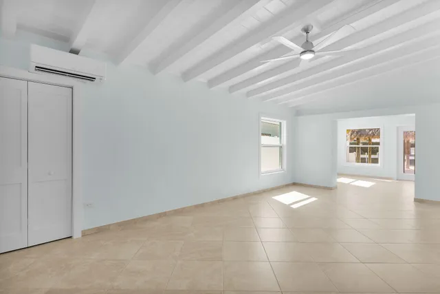 a view of a livingroom with a staircase