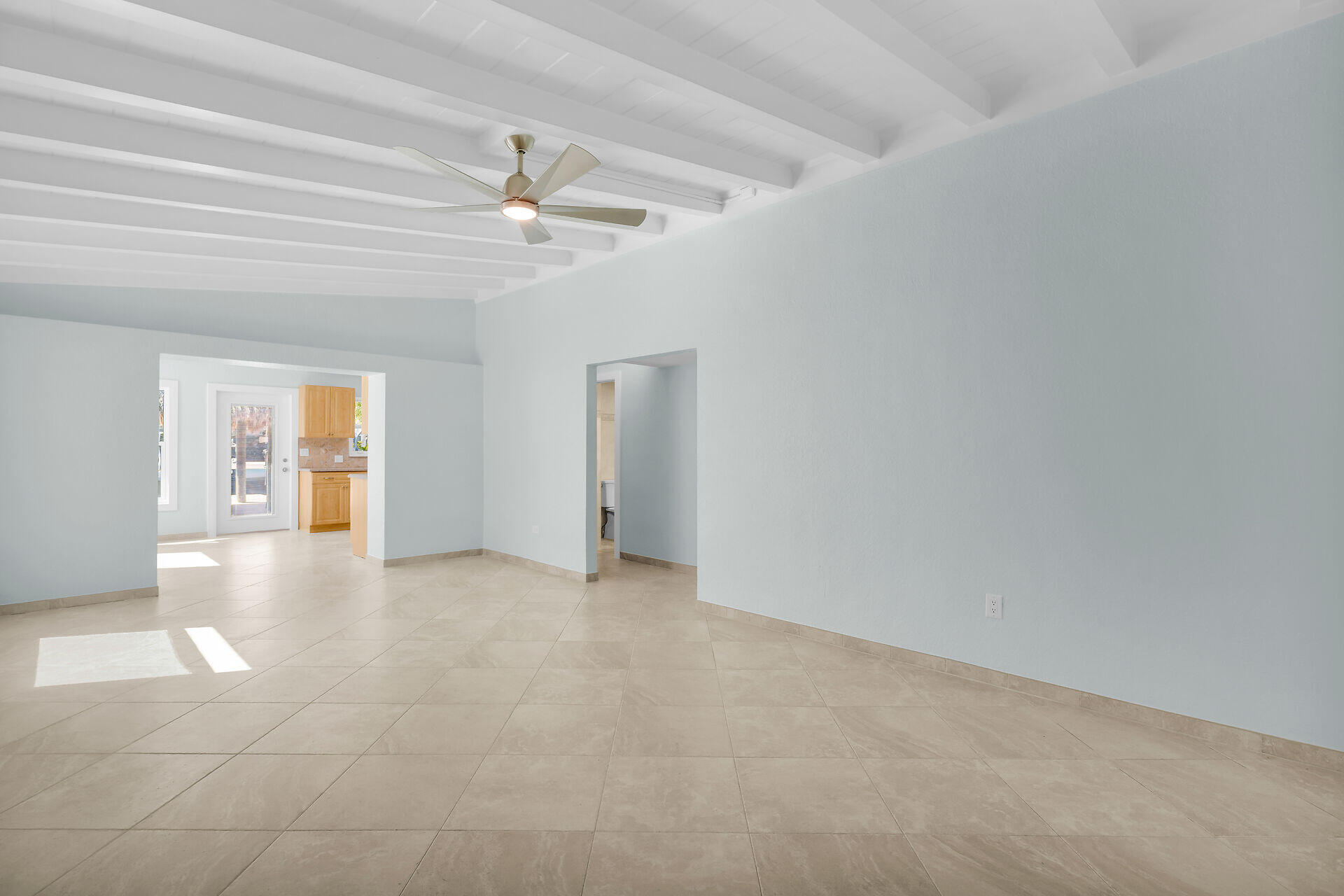 251 Azalea Street Tavernier, FL 33070 - Photo 27 of 58 an empty room with windows and fan