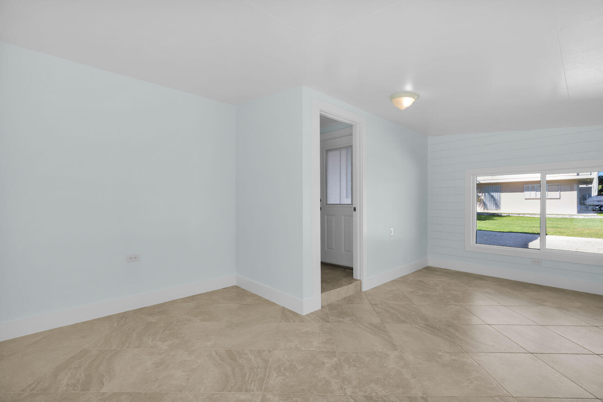 251 Azalea Street Tavernier, FL 33070 - Photo 29 of 58 a view of an empty room with a window