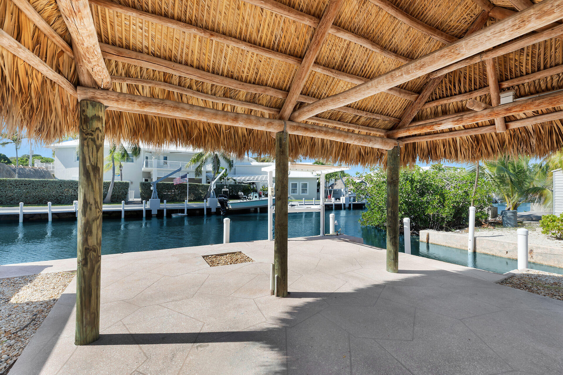 251 Azalea Street Tavernier, FL 33070 - Photo 3 of 58 a view of a swimming pool with a patio