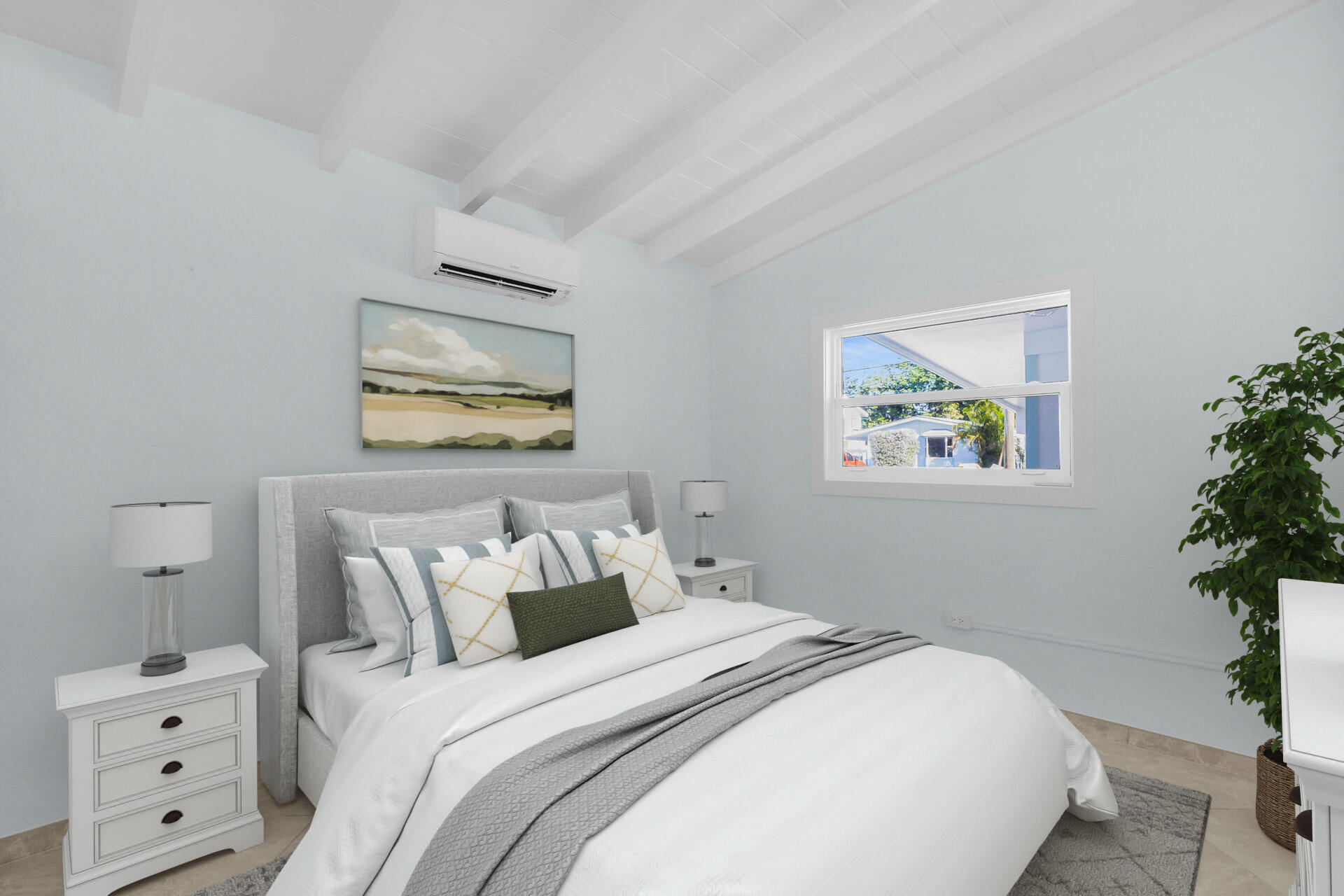 251 Azalea Street Tavernier, FL 33070 - Photo 36 of 58 a bedroom with a bed and a painting on the wall