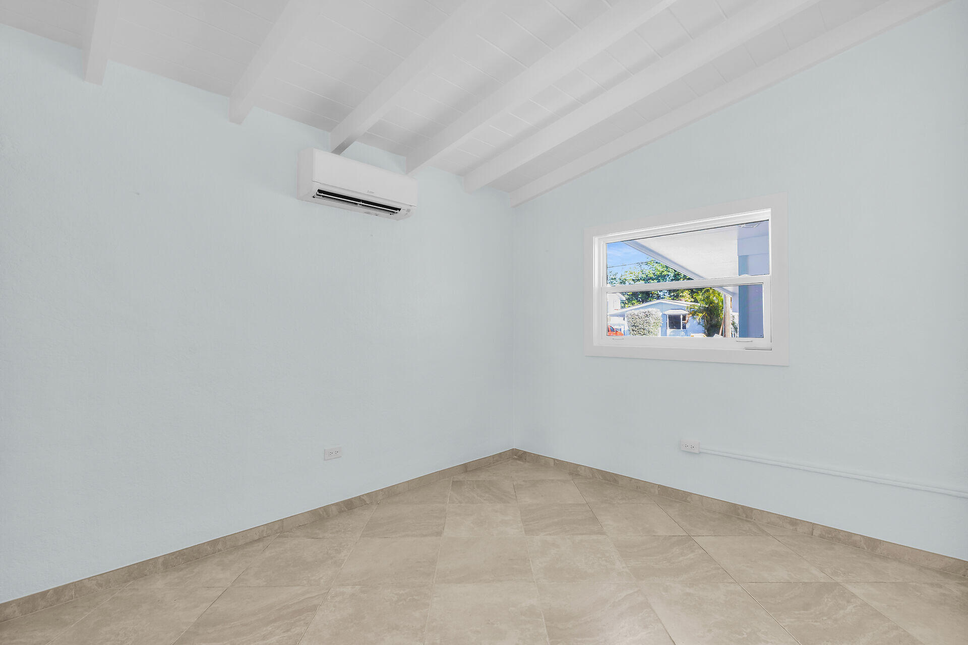 251 Azalea Street Tavernier, FL 33070 - Photo 37 of 58 an empty room with a window