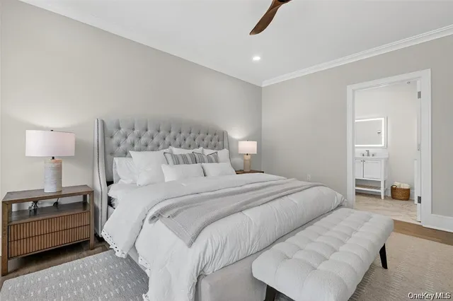 a bedroom with a bed and a couch