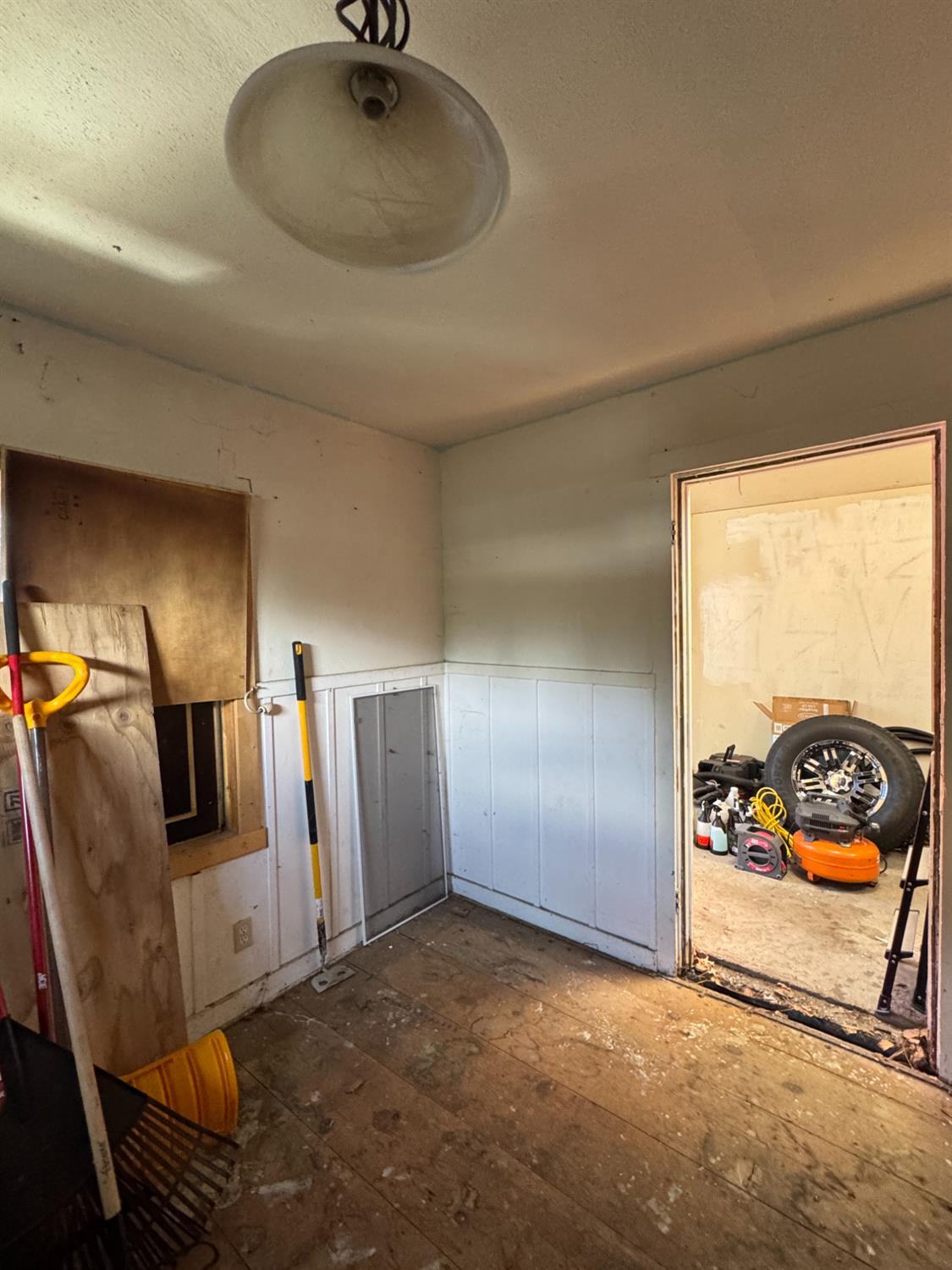 217 Chipmunk Street Kings Beach, CA 96143 - Photo 12 of 18 a view of an empty room with wooden floor windows and closet