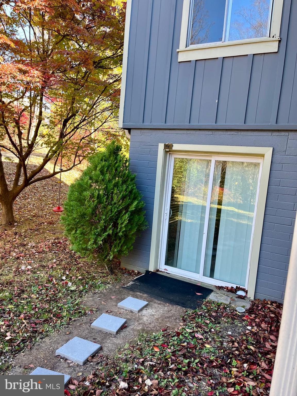 1434 Yellowwood Court Reston, VA 20190 - Photo 16 of 17 a view of a house with a backyard