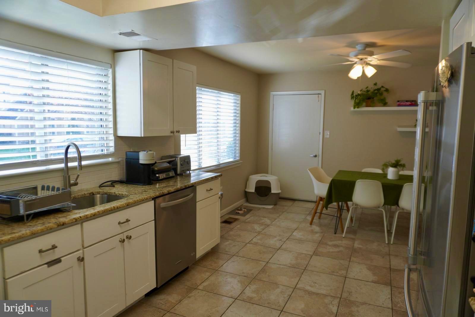 1434 Yellowwood Court Reston, VA 20190 - Photo 6 of 17 a kitchen with a sink and cabinets