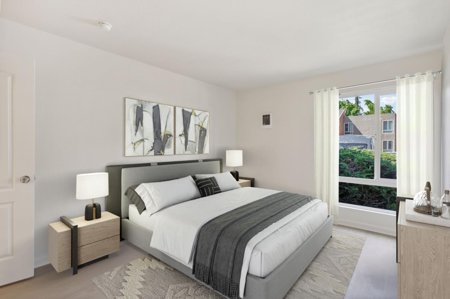 492 Dempsey Road, Unit 194 Milpitas, CA 95035 - Photo 16 of 27 a bedroom with bed and a large window