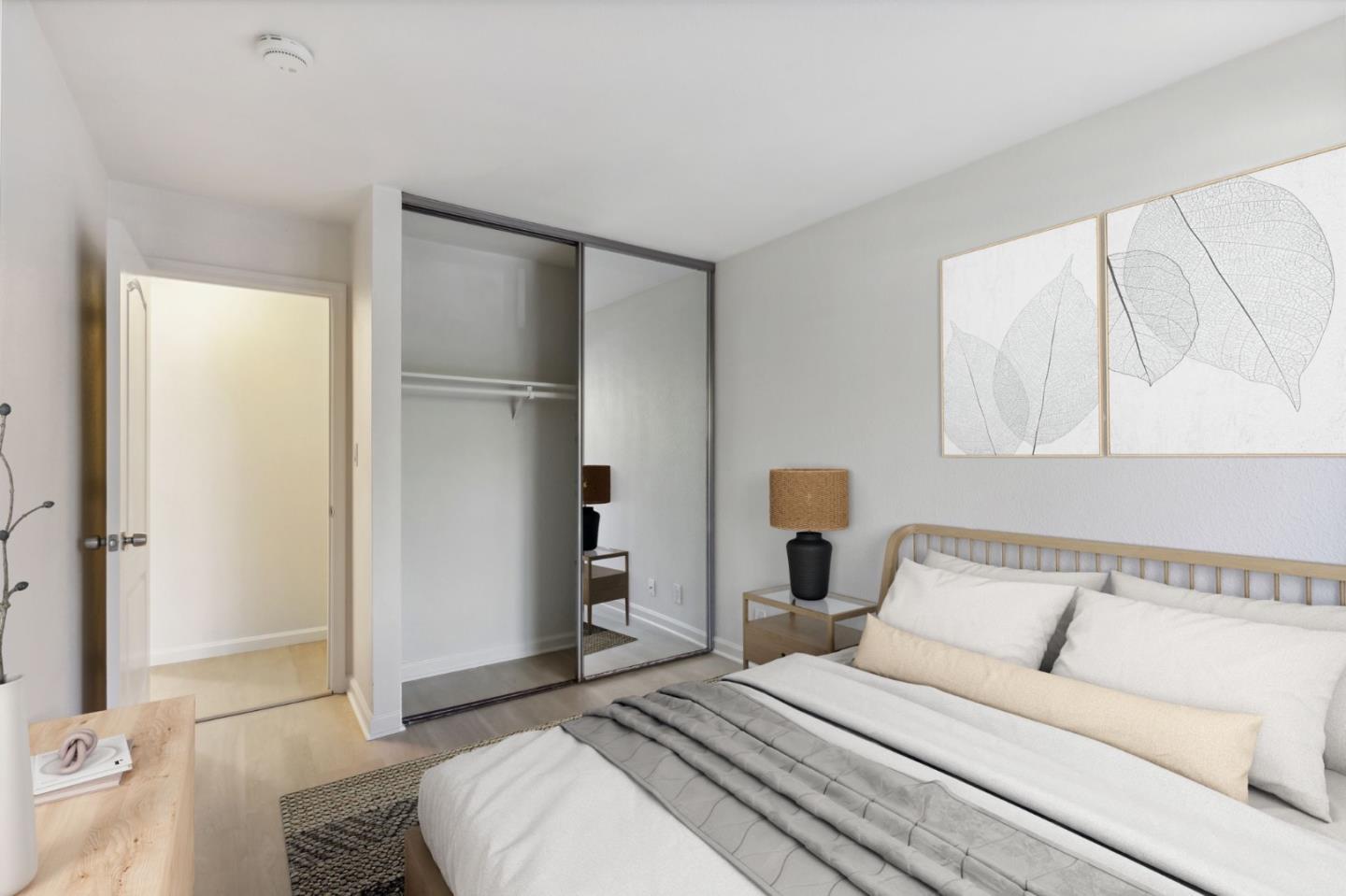 492 Dempsey Road, Unit 194 Milpitas, CA 95035 - Photo 21 of 27 a bedroom with a bed and a cabinets