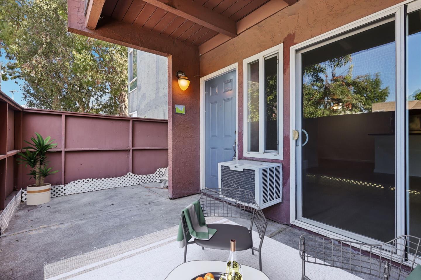 492 Dempsey Road, Unit 194 Milpitas, CA 95035 - Photo 22 of 27 a backyard of a house with outdoor seating