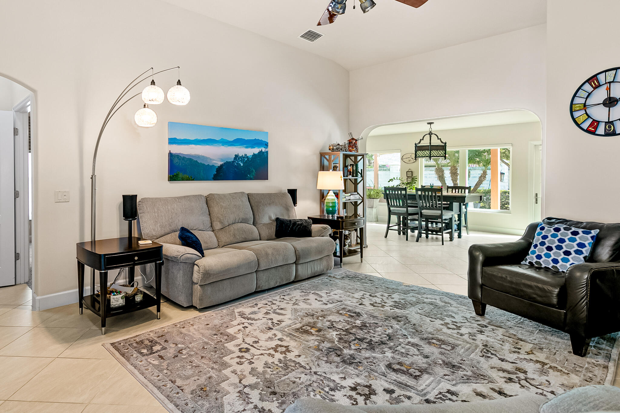 1605 Boca Rio Drive Melbourne, FL 32940 - Photo 12 of 55 a living room with furniture and wooden floor