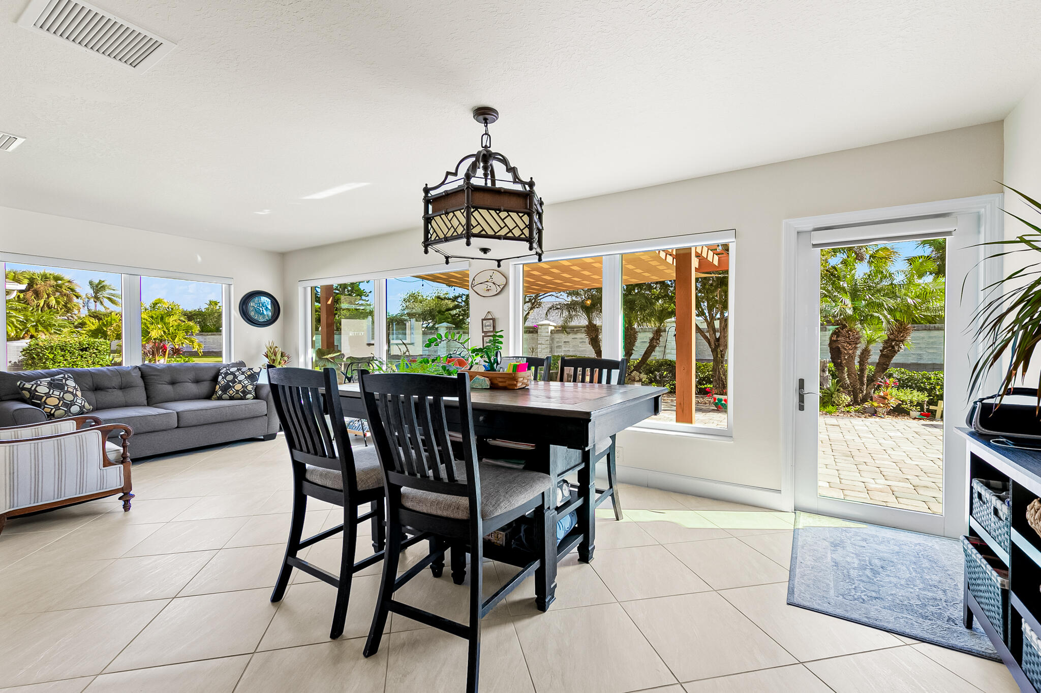 1605 Boca Rio Drive Melbourne, FL 32940 - Photo 15 of 55 a view of a dining room with furniture window and outside view