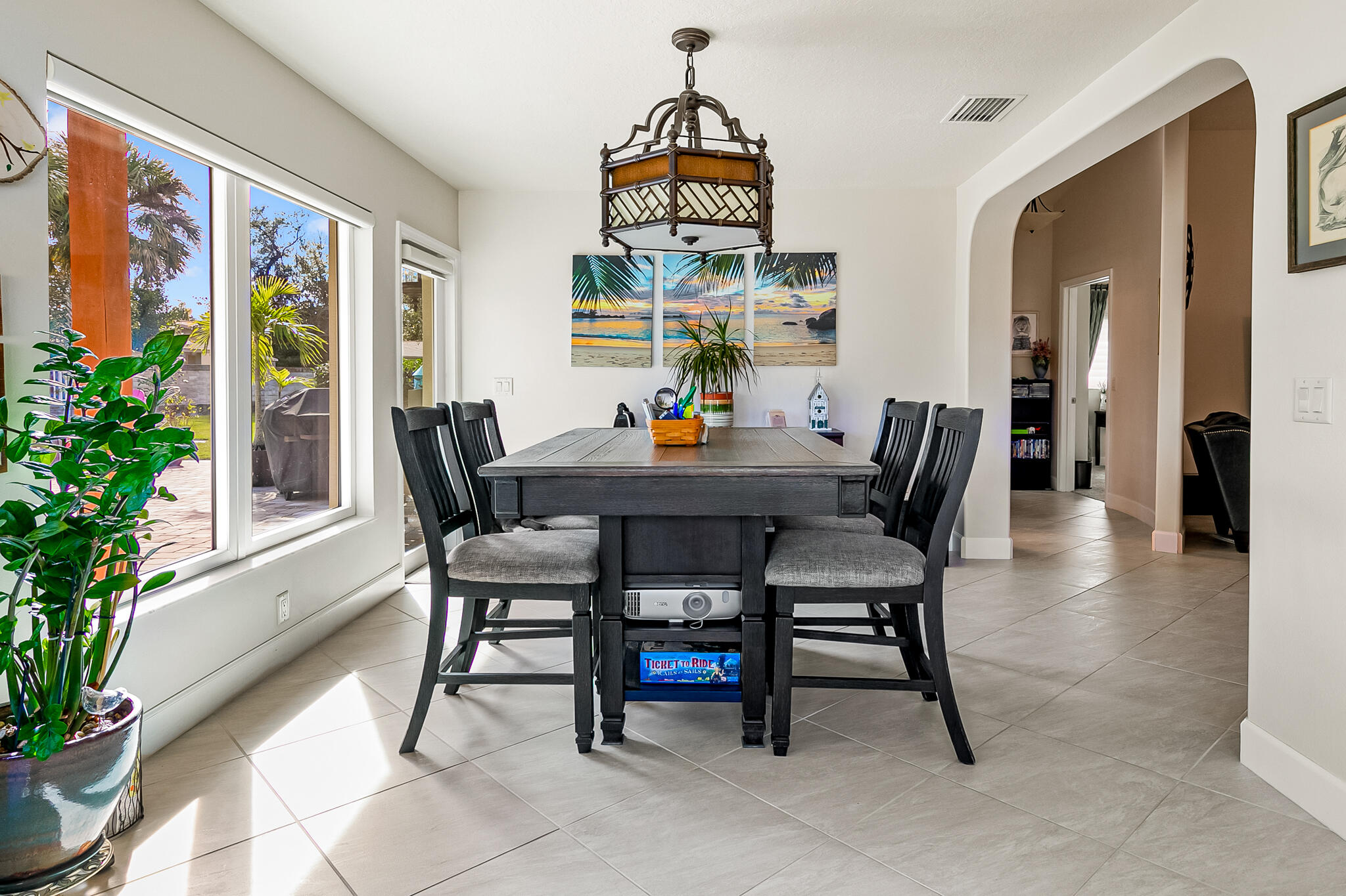 1605 Boca Rio Drive Melbourne, FL 32940 - Photo 16 of 55 a view of a dining room with furniture window and wooden floor
