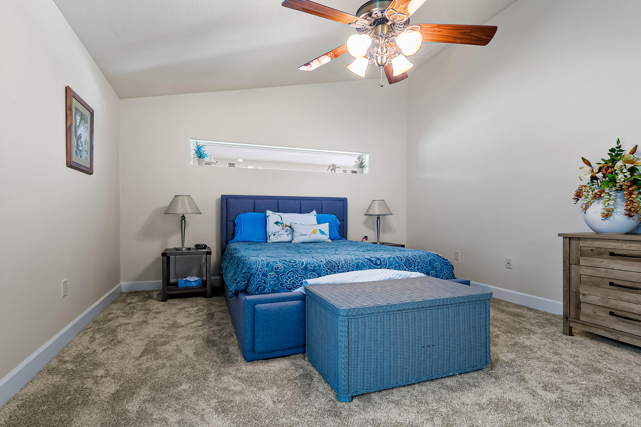 1605 Boca Rio Drive Melbourne, FL 32940 - Photo 18 of 55 a bedroom with a bed and a chandelier