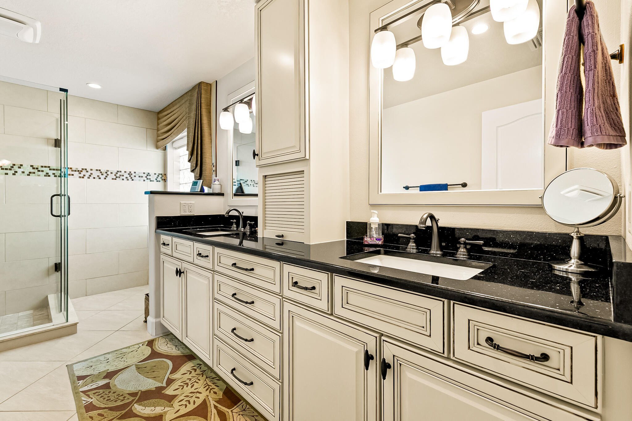1605 Boca Rio Drive Melbourne, FL 32940 - Photo 21 of 55 a kitchen with granite countertop a sink stainless steel appliances and cabinets