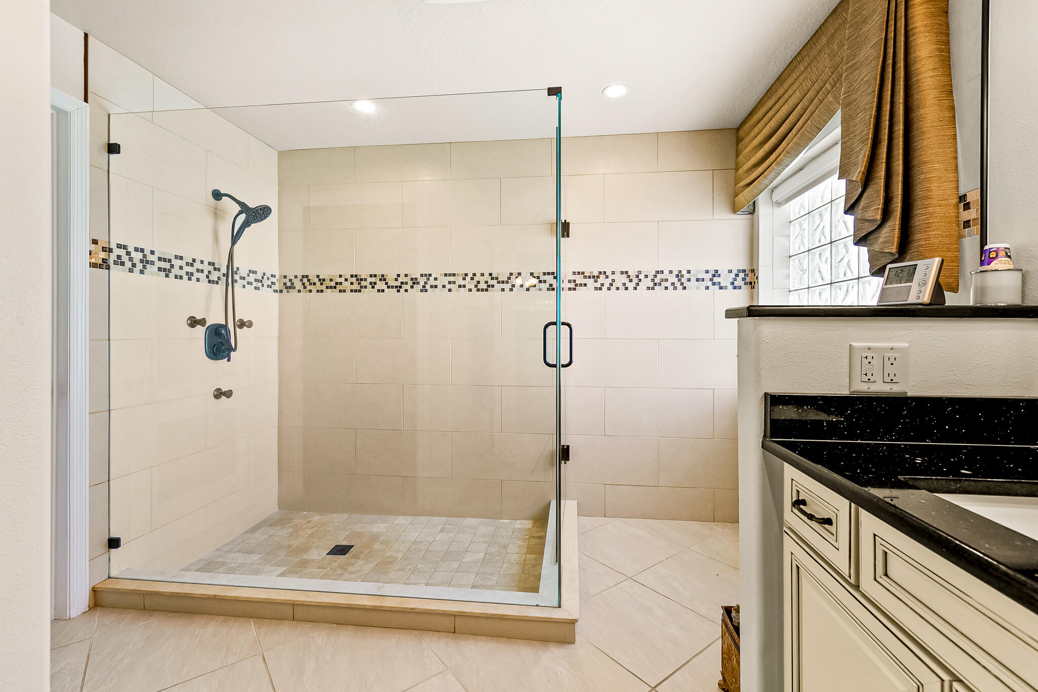 1605 Boca Rio Drive Melbourne, FL 32940 - Photo 23 of 55 a bathroom with a shower and a sink