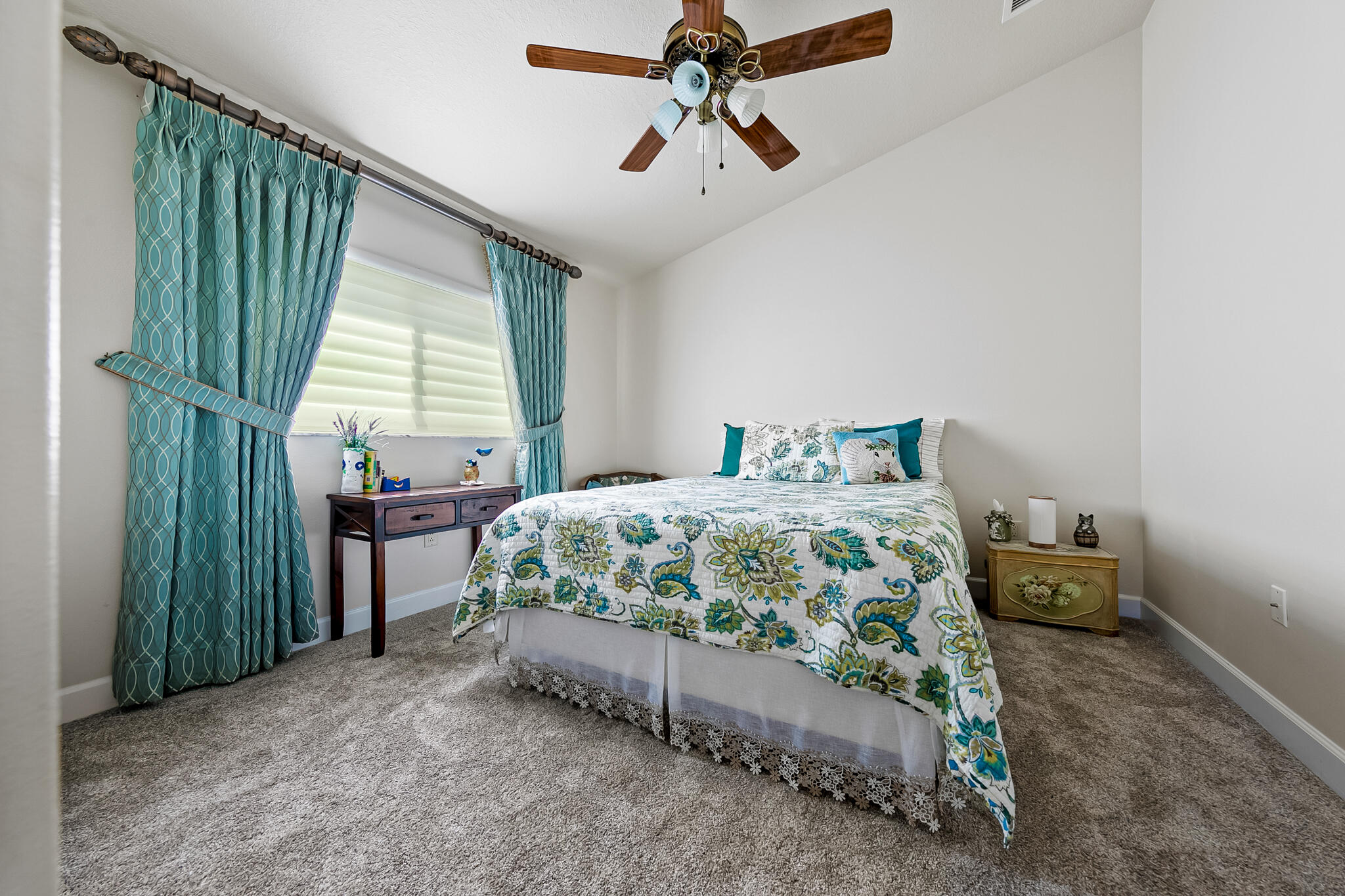 1605 Boca Rio Drive Melbourne, FL 32940 - Photo 24 of 55 a bedroom with a bed and a chandelier