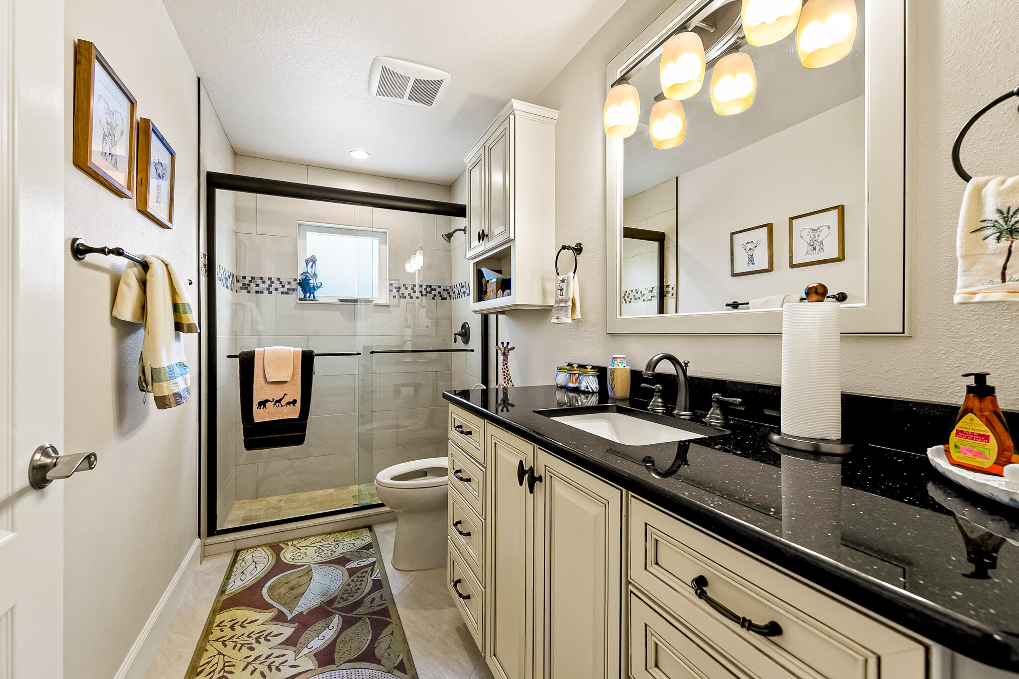 1605 Boca Rio Drive Melbourne, FL 32940 - Photo 26 of 55 a kitchen with stainless steel appliances granite countertop a sink stove and refrigerator