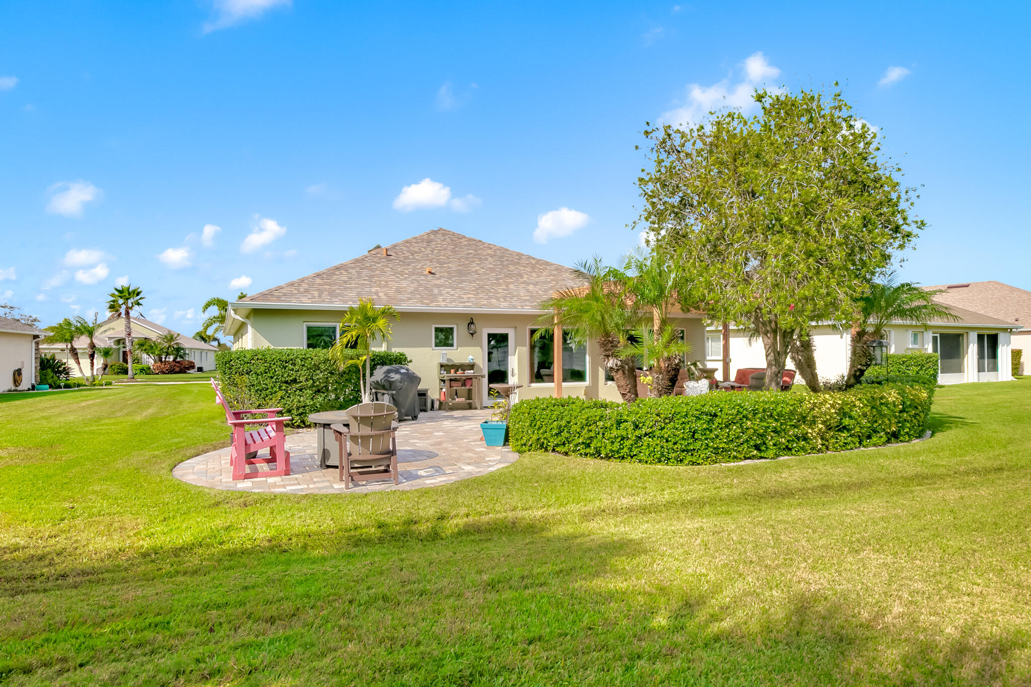 1605 Boca Rio Drive Melbourne, FL 32940 - Photo 32 of 55 a front view of a house with a garden