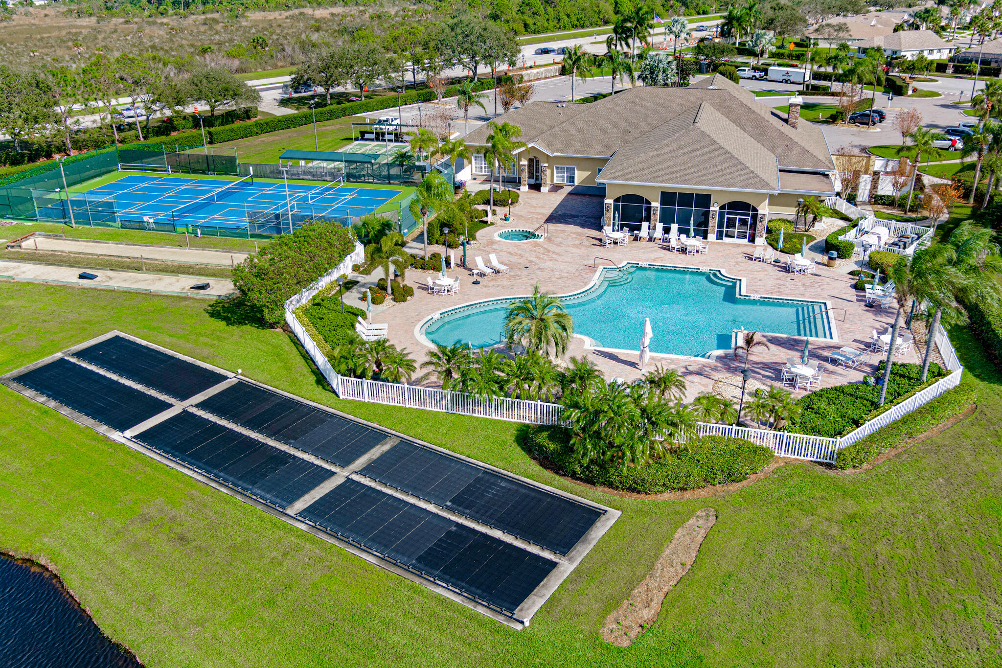 1605 Boca Rio Drive Melbourne, FL 32940 - Photo 36 of 55 an aerial view of residential houses with outdoor space and swimming pool