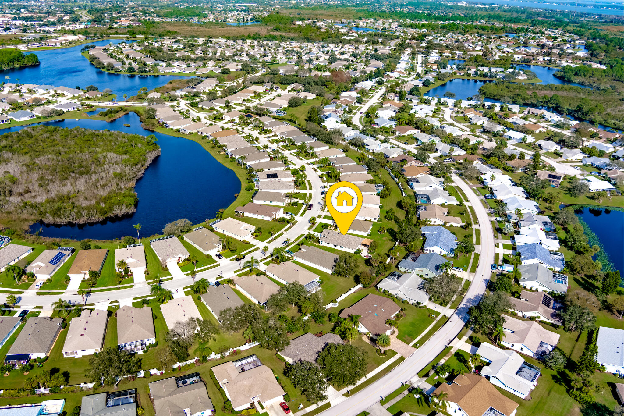 1605 Boca Rio Drive Melbourne, FL 32940 - Photo 50 of 55 an aerial view of residential houses with outdoor space