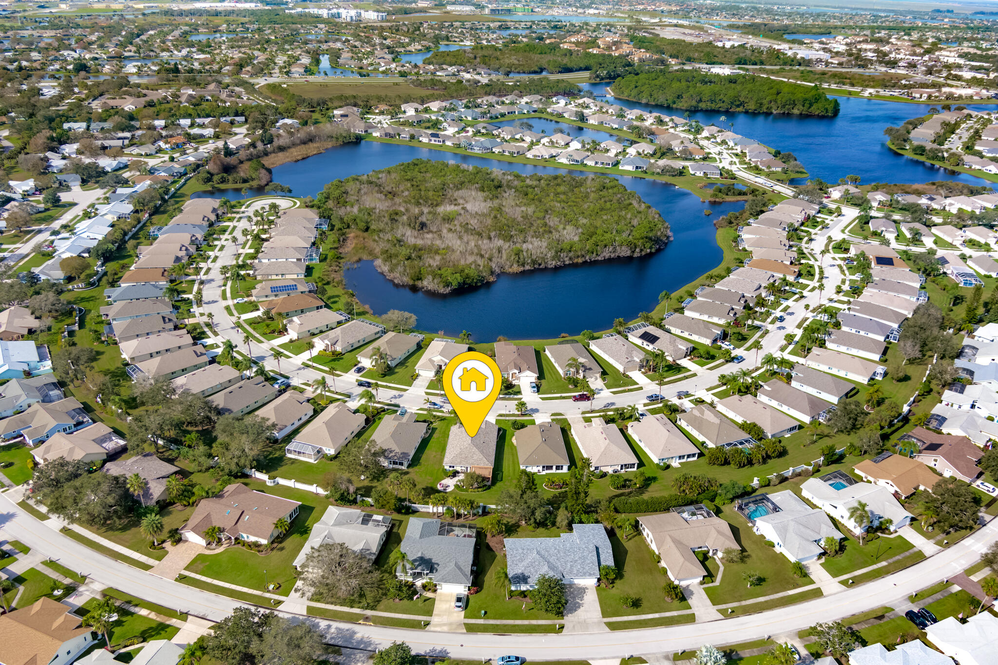 1605 Boca Rio Drive Melbourne, FL 32940 - Photo 52 of 55 an aerial view of residential houses with outdoor space