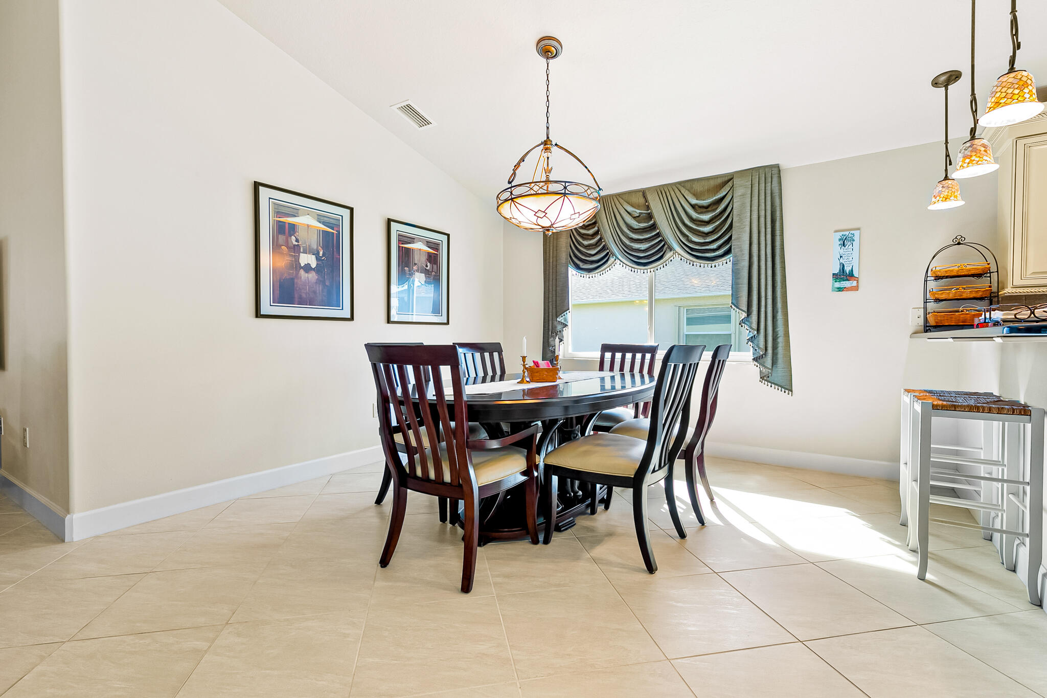 1605 Boca Rio Drive Melbourne, FL 32940 - Photo 10 of 55 a dining room with furniture and window