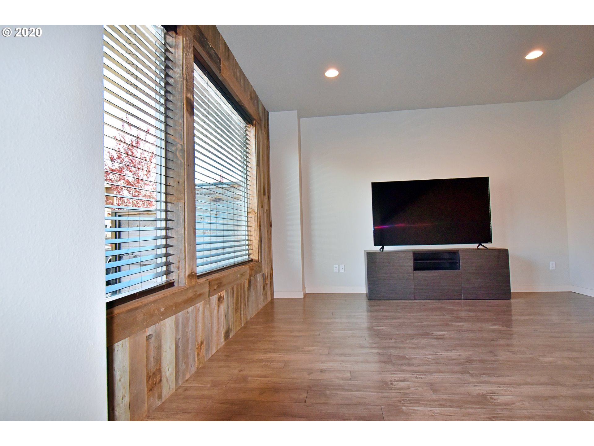 161 North 44th Place Ridgefield, WA 98642 - Photo 13 of 32 a view of a living room with a flat screen tv