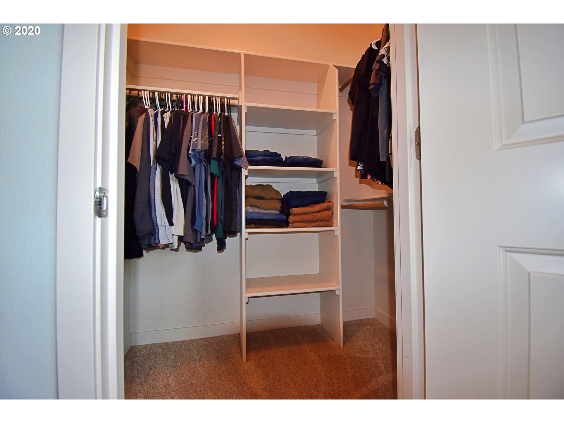 161 North 44th Place Ridgefield, WA 98642 - Photo 26 of 32 a view of walk in closet with clothes and shoes