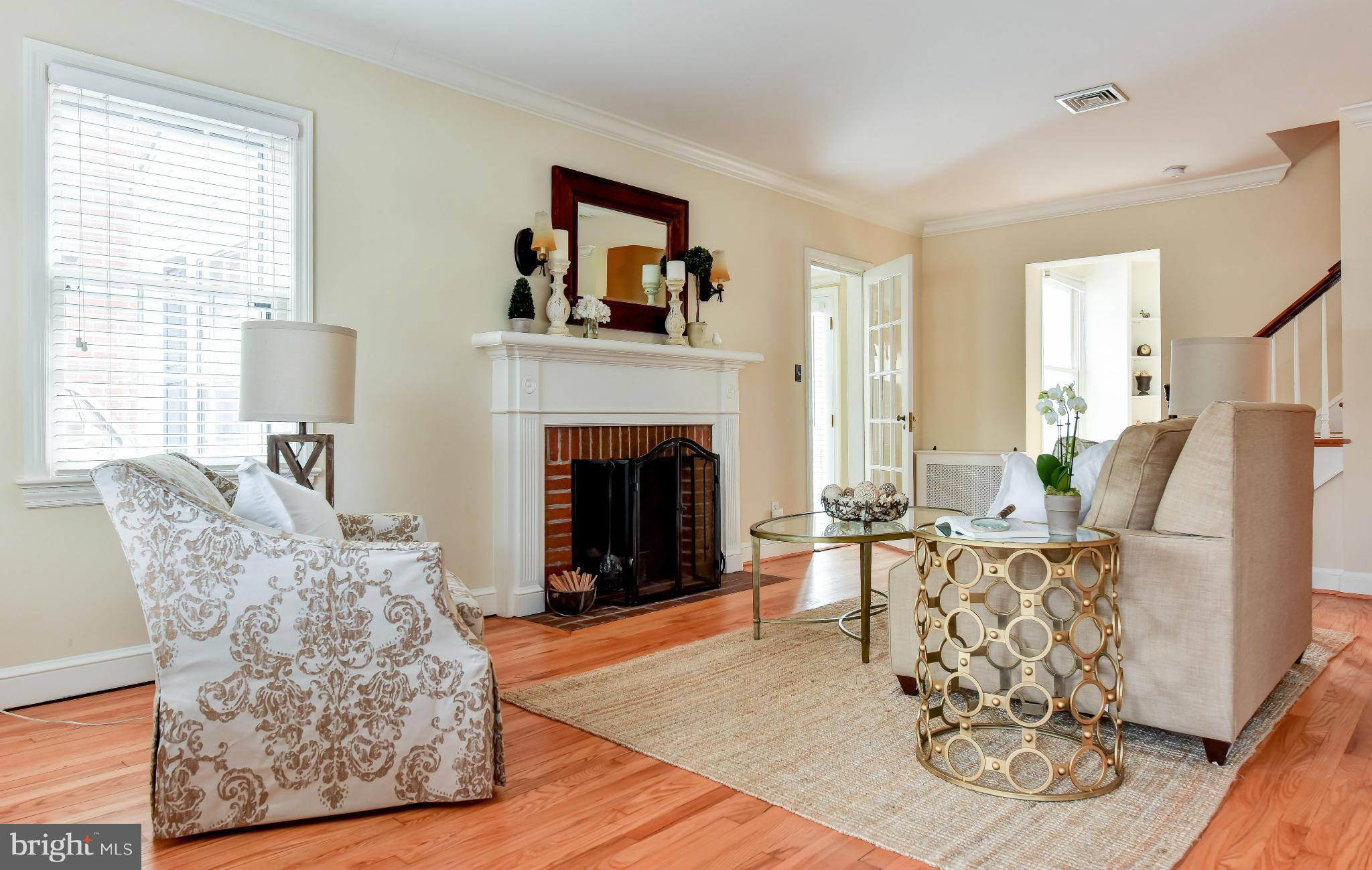 2806 Ridge Rd Drive Alexandria, VA 22302 - Photo 2 of 30 a living room with furniture and a fireplace