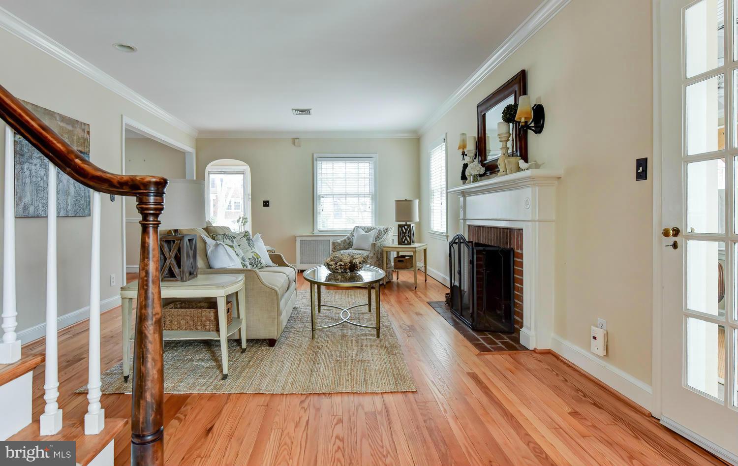 2806 Ridge Rd Drive Alexandria, VA 22302 - Photo 11 of 30 a living room with furniture a fireplace and a window