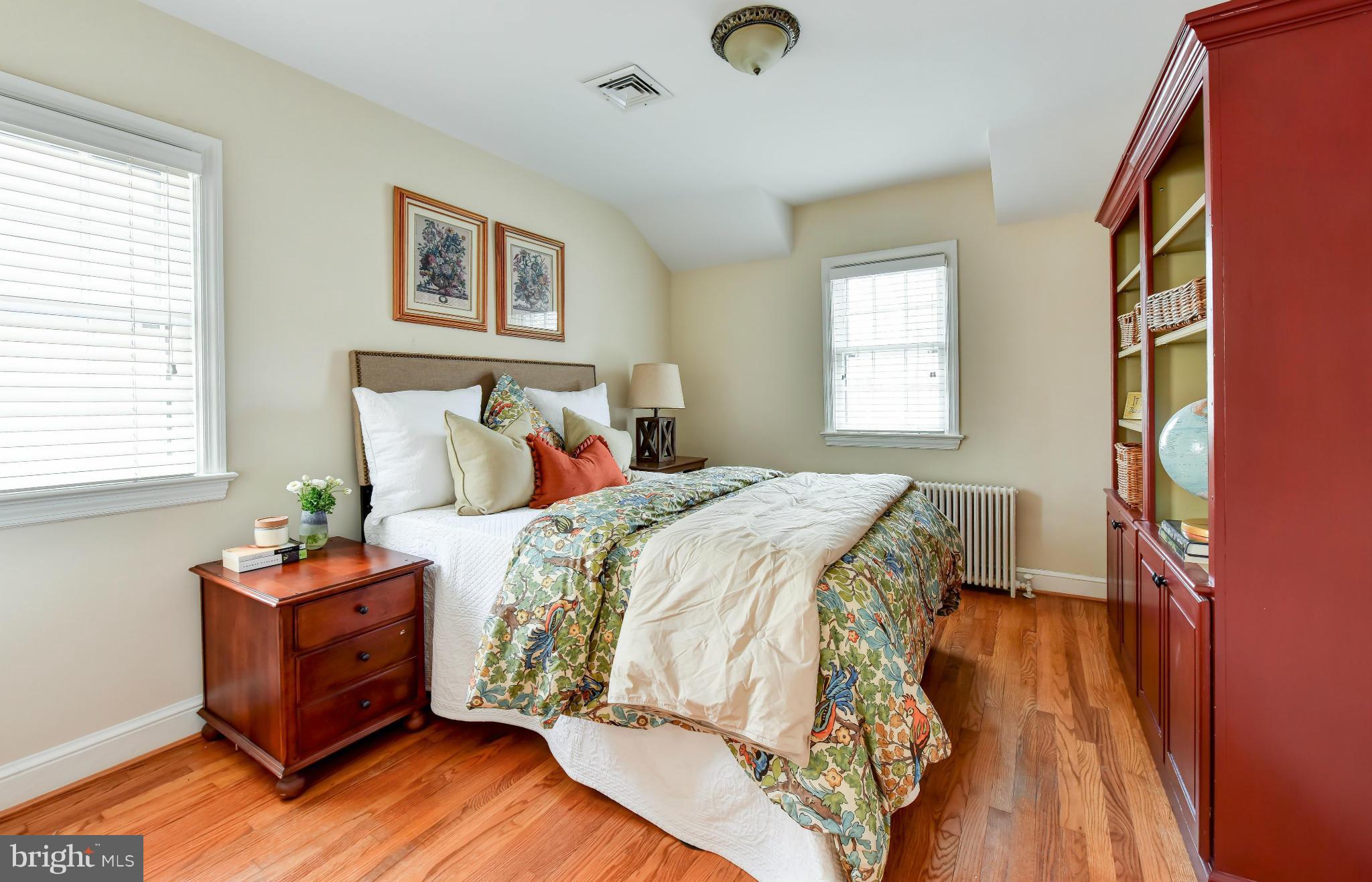 2806 Ridge Rd Drive Alexandria, VA 22302 - Photo 17 of 30 a bedroom with a bed and a window