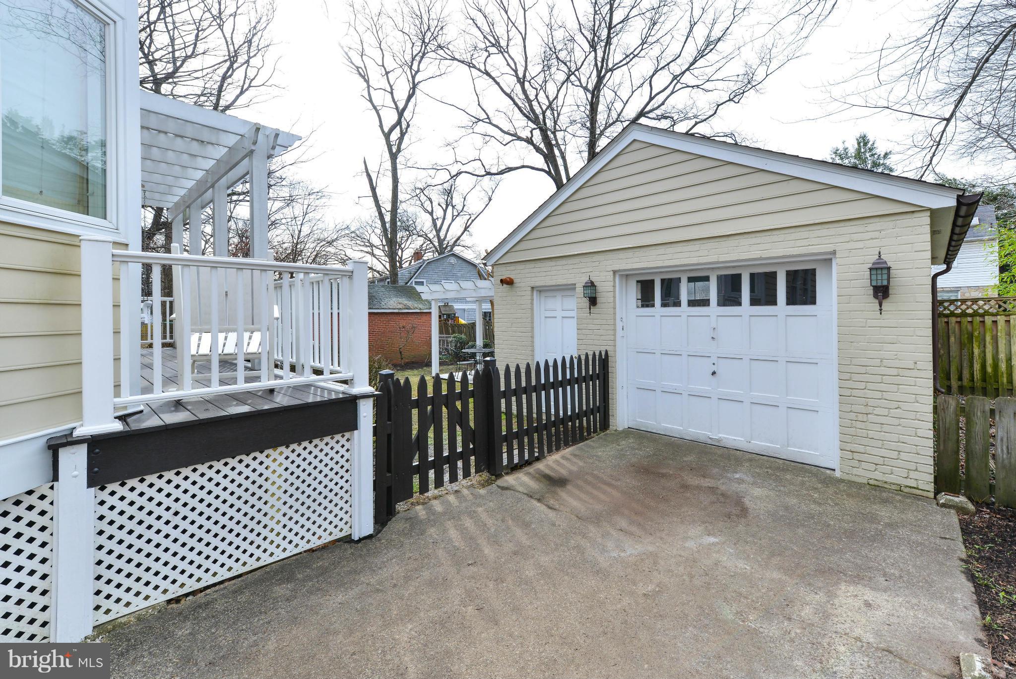 2806 Ridge Rd Drive Alexandria, VA 22302 - Photo 23 of 30 a view of a house with a fence and a yard