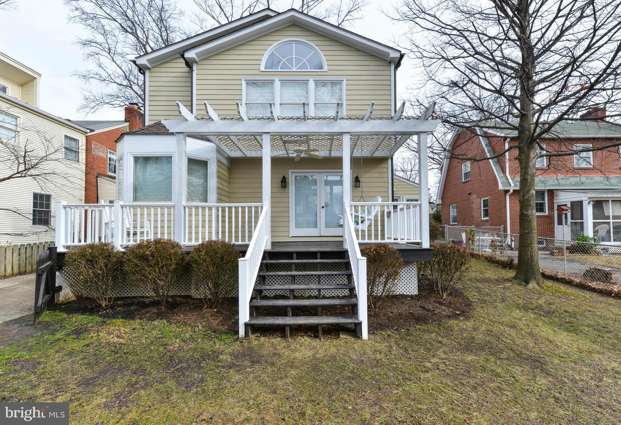 2806 Ridge Rd Drive Alexandria, VA 22302 - Photo 24 of 30 a front view of a house with a yard