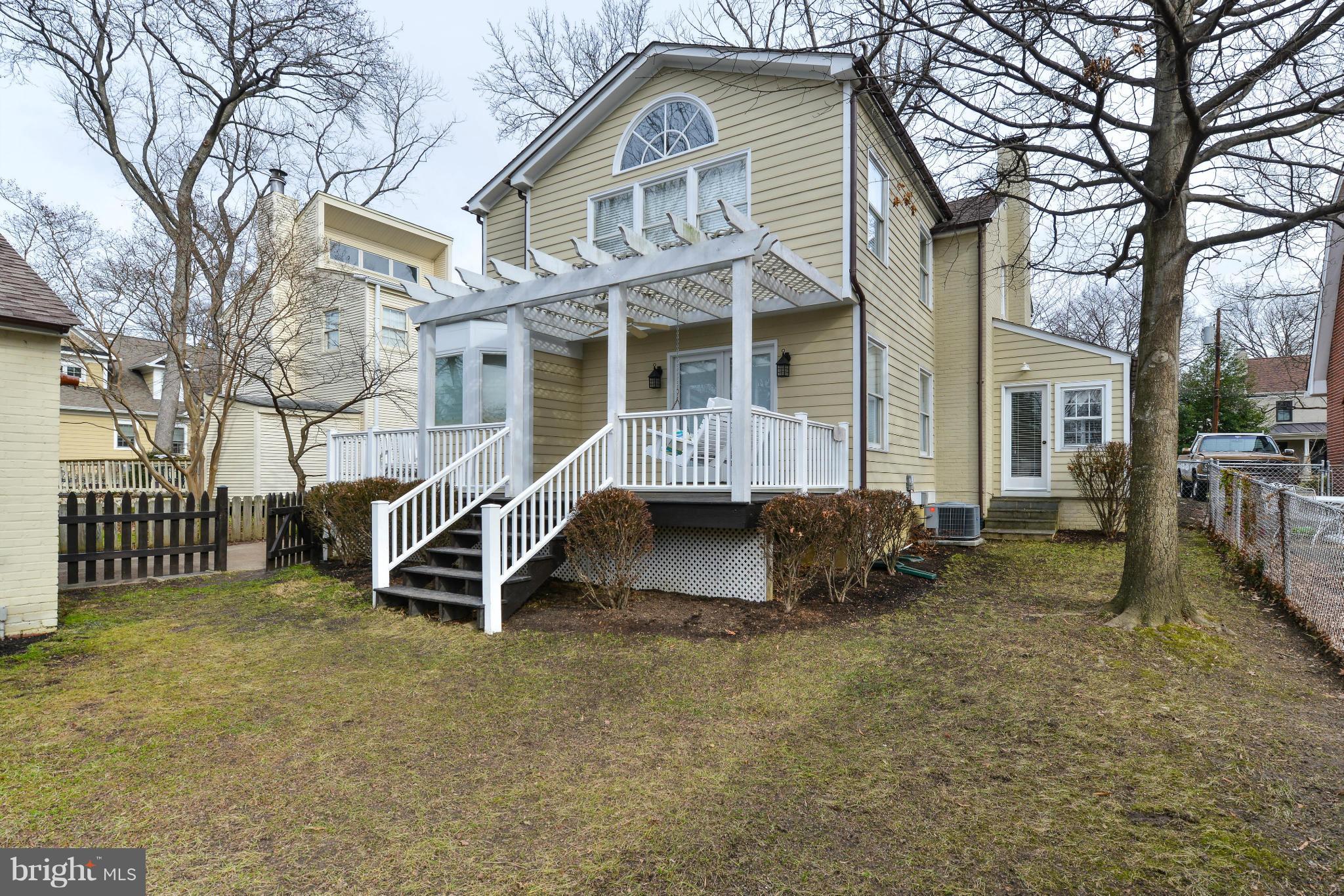 2806 Ridge Rd Drive Alexandria, VA 22302 - Photo 25 of 30 a front view of a house with a yard and garage