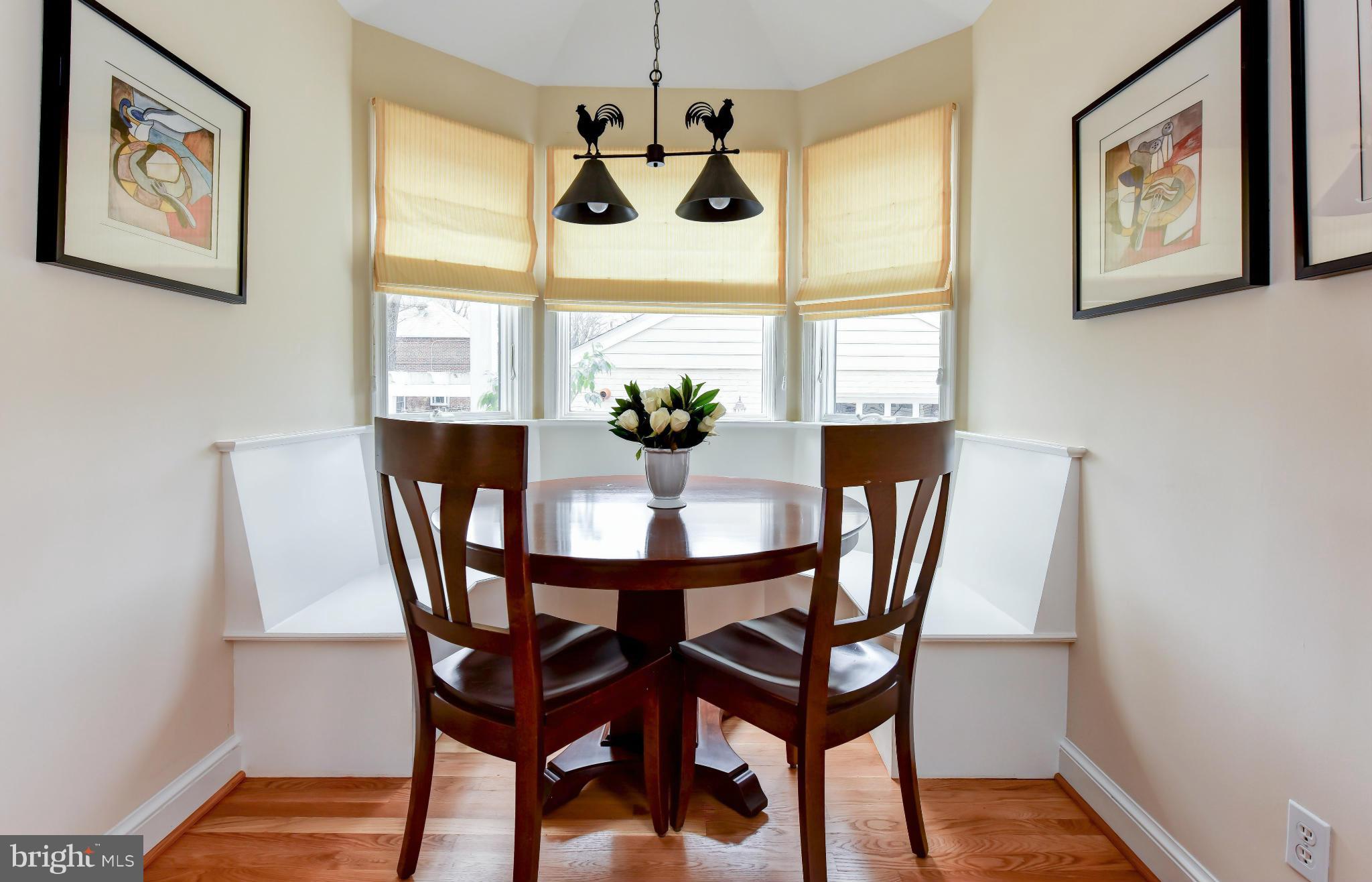 2806 Ridge Rd Drive Alexandria, VA 22302 - Photo 7 of 30 a view of a dining room with furniture window and wooden floor