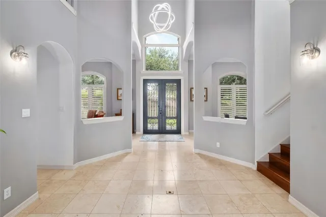 a view of a hallway with windows