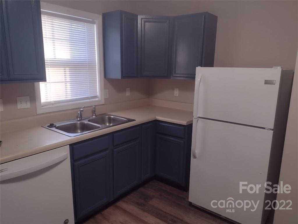 111 Sunset Drive Clover, SC 29710 - Photo 7 of 12 a kitchen with a sink a refrigerator and window