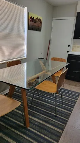 a blue and white photo of a living room