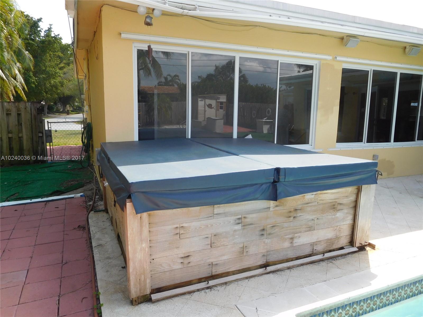 14441 Snapper Drive Coral Gables, FL 33158 - Photo 23 of 27 a view of entrance gate of house