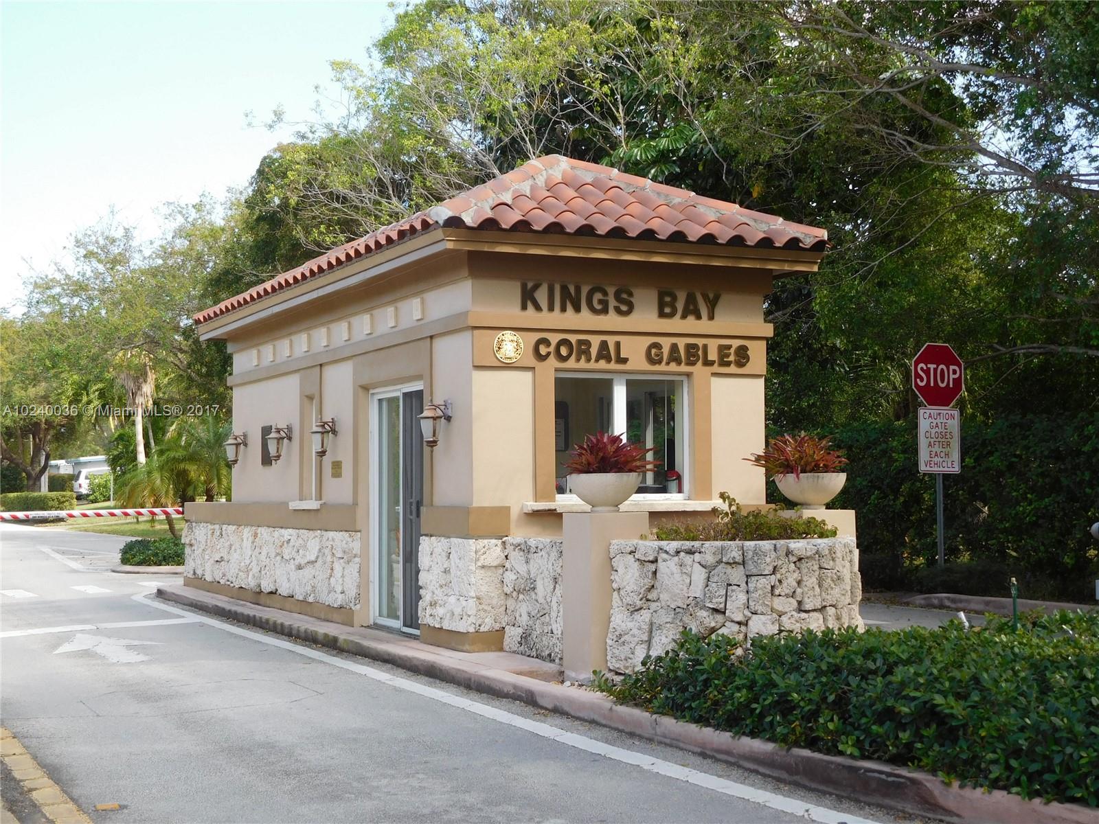 14441 Snapper Drive Coral Gables, FL 33158 - Photo 27 of 27 a front view of a house with a porch