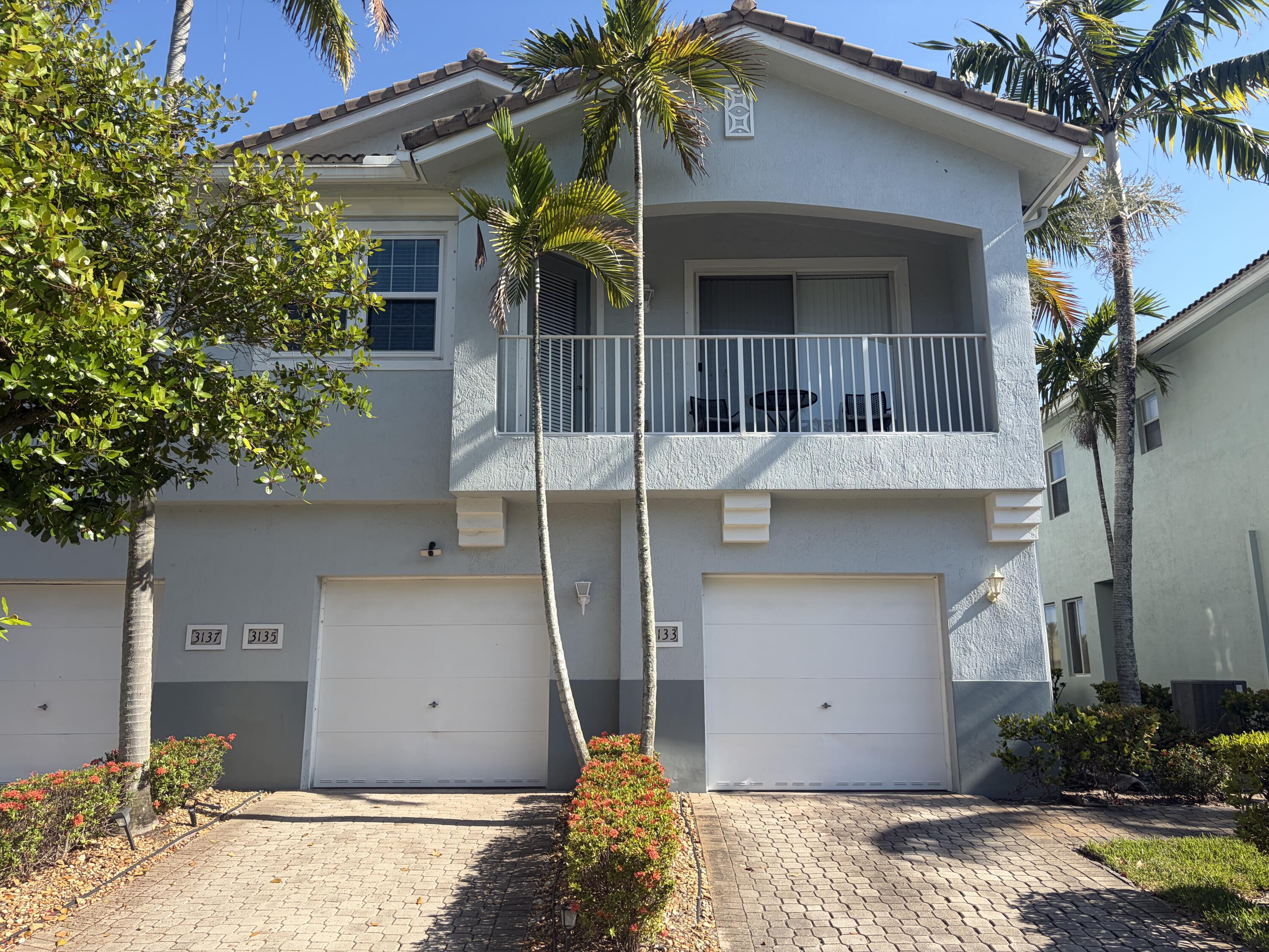 3133 Laurel Ridge Circle Riviera Beach, FL 33404 - Photo 2 of 27 Front Exterior