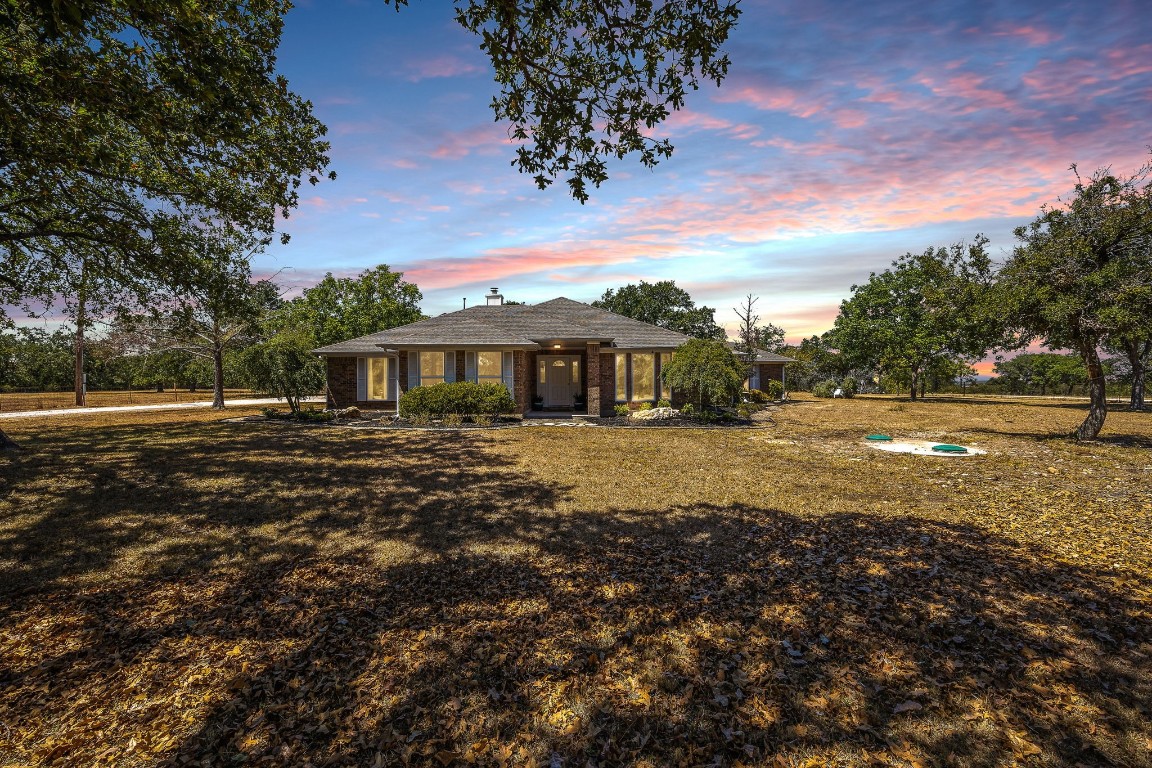 201 Young Ranch Road Georgetown, TX 78633 - Photo 1 of 40 a front view of a house with a yard