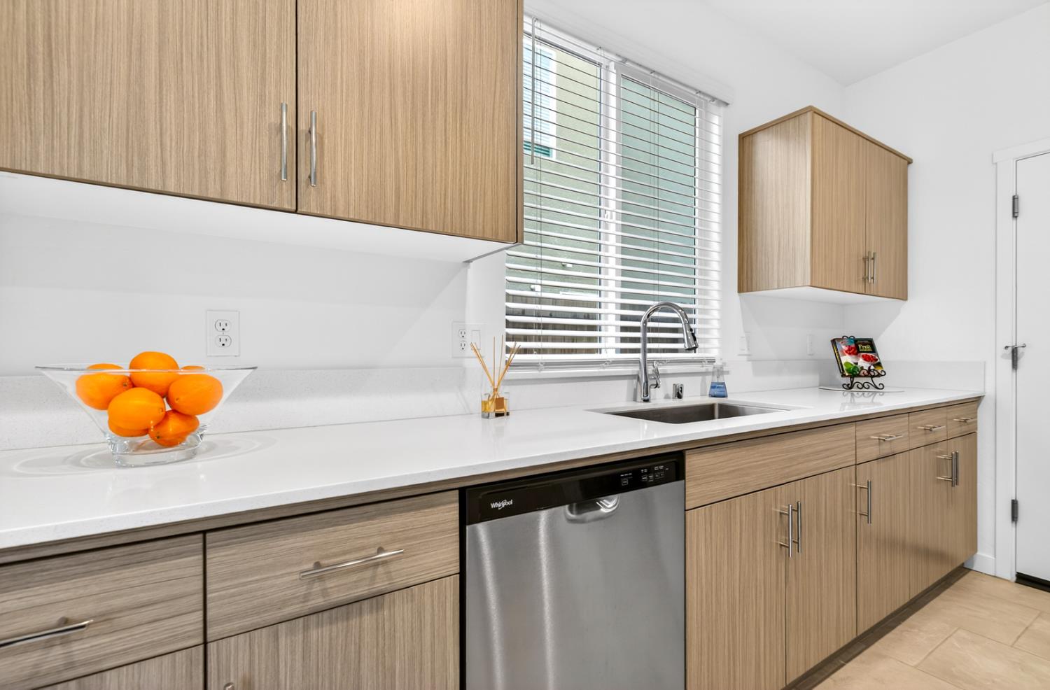 317 Talus Way South Madera, CA 93636 - Photo 18 of 61 a kitchen with stainless steel appliances cabinets and a window