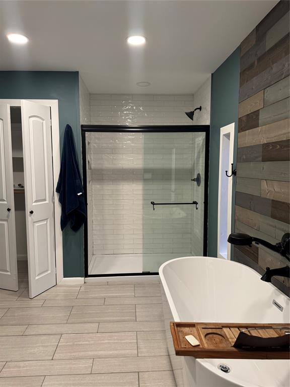 708 West 1st Street Hico, TX 76457 - Photo 19 of 24 a bathroom with a bathtub and a shower